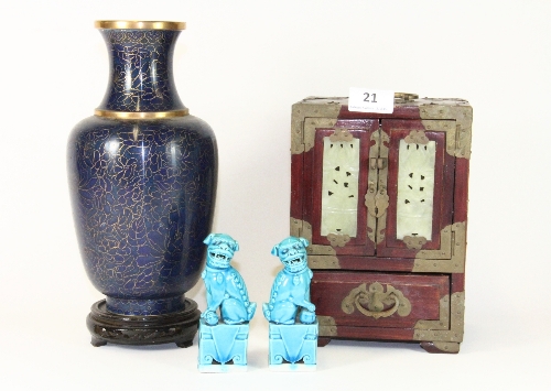 A Chinese cloisonné vase on stand, a Chinese jewellery casket and a pair of Chinese dogs of fo