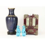 A Chinese cloisonné vase on stand, a Chinese jewellery casket and a pair of Chinese dogs of fo