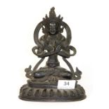 A Tibetan bronze figure of a seated Tara, H 19cm