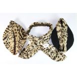 Two 1930's leopard skin trimmed pillbox hats and a 1930's leopard skin collar