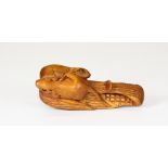 A carved fruitwood amulet of 2 mice on maize, L 7cm