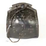 An 18th century hammered and stitched leather water carrier, W 17cm, H 20cm