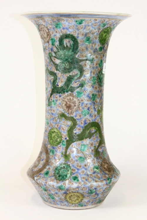 A Chinese hand painted porcelain vase incised and decorated with images of dragons, H 39cm, 19th/