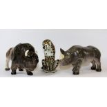 2 Melba ware figures of a bison (H 14cm) and a rhino and a further unmarked figure of a leopard