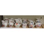 A set of 12 Royal Worcester reproduction milk jugs