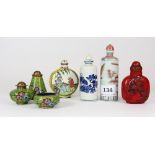 2 Chinese porcelain snuff bottles, a Canton enamelled snuff bottle and a further red snuff bottle,