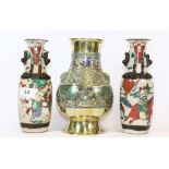 An early 20th century Chinese cloisonné on bronze vase and a pair of early 20th century Chinese