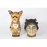 A 1920s lustreware Bonzo dog and an early porcelain tobacco jar