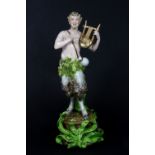 A 19th century continental porcelain figure of a satyr (restored), H 25cm