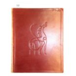 A red leather bound volume of "Native Art Of Norway" by Hauglid, Asker, Engelstad, Traetteberg,