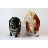 A large Melba ware ceramic figure of a bull (H 25cm) and a similar large unmarked figure of a bison