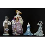 A Nao figure of a boy, 2 Coalport lady figures and a Victorian And Albert Museum limited edition