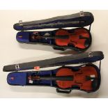 2 modern cased violins