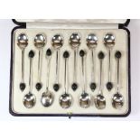 A cased set of 12 Asprey hallmarked silver coffee bean spoons Sheffield circa 1904