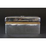 A hallmarked silver cigarette box, 14cm x 9cm x 6cm