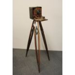 An early Kodak plate camera and tripod