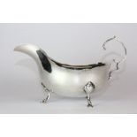 A hallmarked silver sauce boat.
