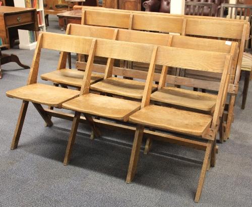 Four 1920s sets of 3 folding oak chairs.