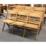 Four 1920s sets of 3 folding oak chairs.