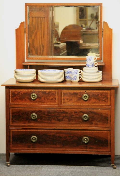 An Edwardian inlaid mahogany dressing table, W 106cm