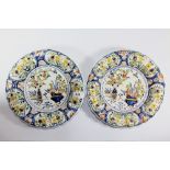 A pair of 18th century Dutch Delft polychrome decorated plates. D. 28.5 cm.