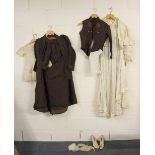 A Victorian ladies silk coat, blouse, under skirt, skirt and waist coat with silk shoes