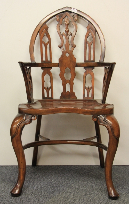 A superb Gothic style hardwood Windsor type armchair.