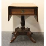 An early 19th century drop leaf mahogany tea table.