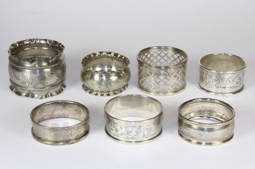 Seven hallmarked silver napkin rings.