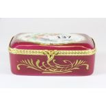 A Limoges porcelain casket, 10.5cm x 7.5cm x 4cm.