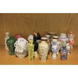 A quantity of miniature porcelain vases.