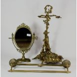 A brass umbrella stand, a brass towel rail and dressing table mirror.