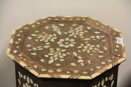 Islamic Interest. A mother of pearl and camel bone inlaid octagonal table together with a carved - Image 3 of 4