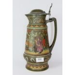 A large hand painted German stoneware and pewter jug, H. 33cm.