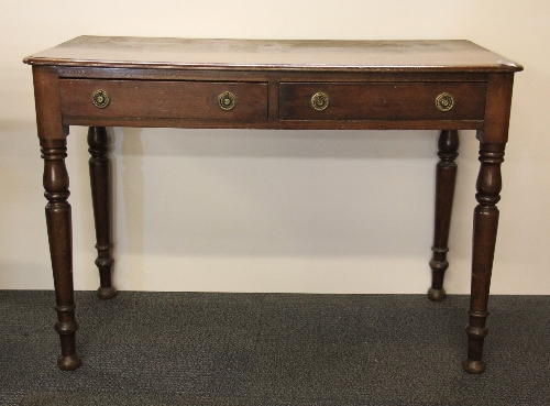A Victorian mahogany two drawer desk, W. 106cm, D. 50cm.