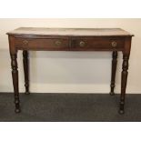 A Victorian mahogany two drawer desk, W. 106cm, D. 50cm.