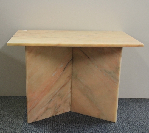 A pink marble coffee table, 74cm x 46cm x 50cm