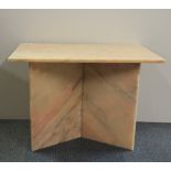 A pink marble coffee table, 74cm x 46cm x 50cm