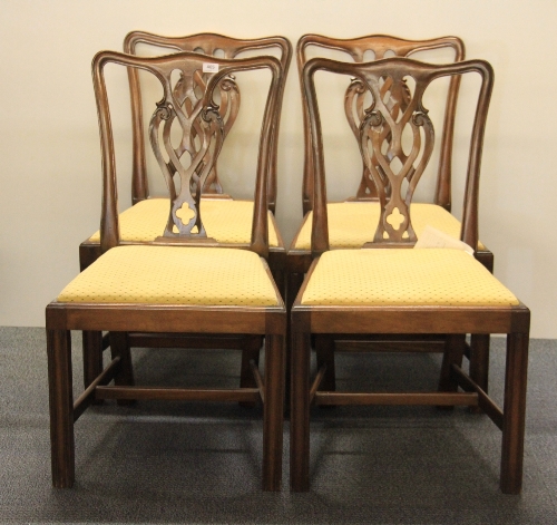 A set of four Georgian style mahogany dining chairs.