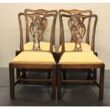 A set of four Georgian style mahogany dining chairs.