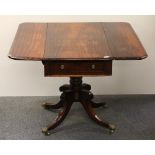 A Regency mahogany drop leaf tea table.