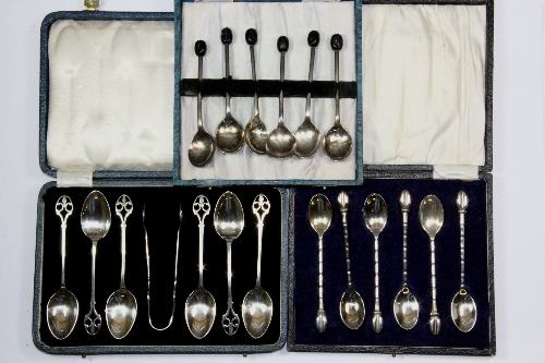 Three good sets of silver plated coffee spoons.