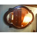 An Edwardian mahogany wall mirror, the s