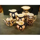 Six pieces of Edwardian earthenware, eac