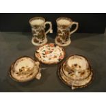 A pair of 19th century Ironstone mugs of