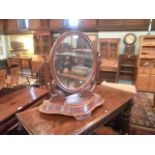 A Victorian mahogany toilet mirror, the