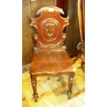 A Victorian mahogany hall chair, the sha