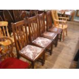 A set of four 1920's oak dining chairs.