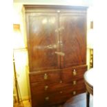 A George III mahogany linen press (conve