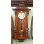 A late Victorian walnut cased Vienna wal